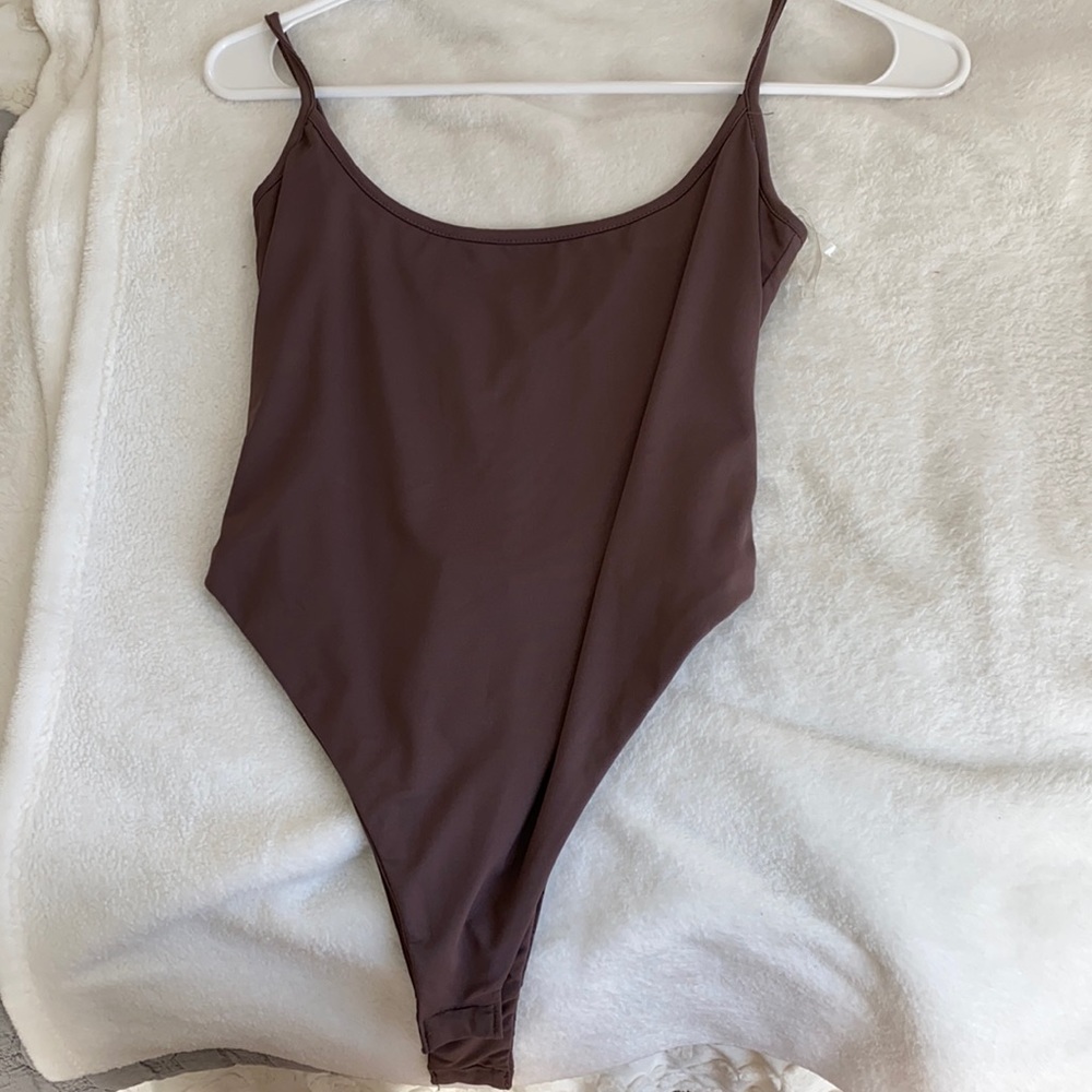 Meshiki body suit in color mauve